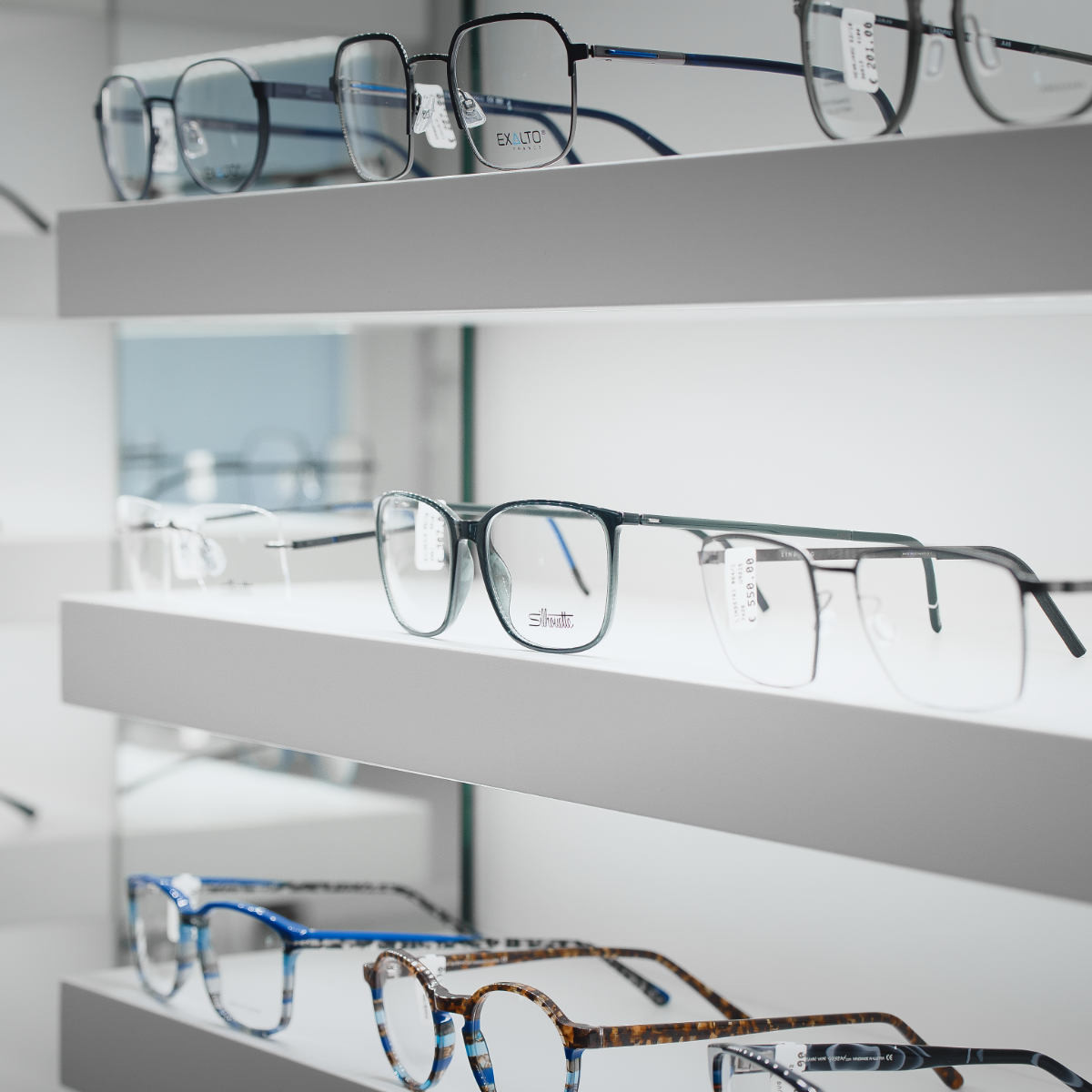 Angled view of Silhouette eyewear on a shelf at Optik Maurer in Mittersill - minimalist elegance and lightweight design.
